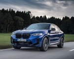 2022 BMW X4 M Competition (Color: Marina Bay Blue Metallic) Front Three-Quarter Wallpapers 150x120