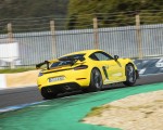 2022 Porsche 718 Cayman GT4 RS (Color: Racing Yellow) Rear Three-Quarter Wallpapers 150x120