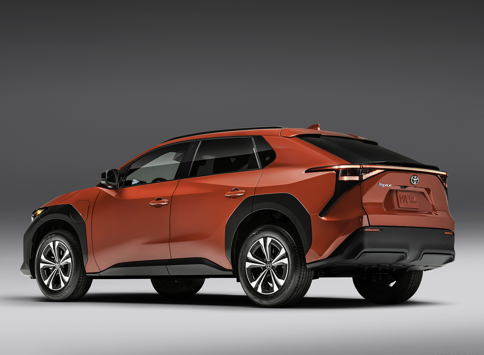 2023 Toyota bZ4X XLE (Color: Supersonic Red; US-Spec) Rear Three-Quarter Wallpapers (3)