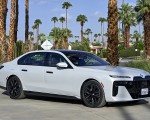 2023 BMW 760i xDrive (Color: Mineral White Metallic; US-Spec) Front Three-Quarter Wallpapers 150x120