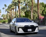 2023 BMW 760i xDrive (Color: Mineral White Metallic; US-Spec) Front Three-Quarter Wallpapers 150x120