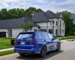 2023 BMW X7 M60i xDrive (Color: Frozen Marina Bay Blue; US-Spec) Rear Three-Quarter Wallpapers 150x120