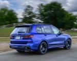 2023 BMW X7 M60i xDrive (Color: Frozen Marina Bay Blue; US-Spec) Rear Three-Quarter Wallpapers 150x120