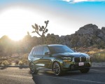 2023 BMW X7 M60i xDrive (Color: Verde Ermes; US-Spec) Front Three-Quarter Wallpapers 150x120
