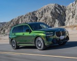 2023 BMW X7 M60i xDrive (Color: Verde Ermes; US-Spec) Front Three-Quarter Wallpapers 150x120