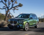 2023 BMW X7 M60i xDrive (Color: Verde Ermes; US-Spec) Front Three-Quarter Wallpapers 150x120