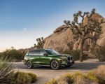2023 BMW X7 M60i xDrive (Color: Verde Ermes; US-Spec) Front Three-Quarter Wallpapers 150x120