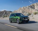 2023 BMW X7 M60i xDrive (Color: Verde Ermes; US-Spec) Front Three-Quarter Wallpapers 150x120