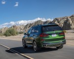 2023 BMW X7 M60i xDrive (Color: Verde Ermes; US-Spec) Rear Three-Quarter Wallpapers 150x120