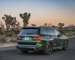 2023 BMW X7 M60i xDrive (Color: Verde Ermes; US-Spec) Rear Three-Quarter Wallpapers 150x120