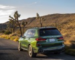 2023 BMW X7 M60i xDrive (Color: Verde Ermes; US-Spec) Rear Three-Quarter Wallpapers 150x120