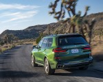 2023 BMW X7 M60i xDrive (Color: Verde Ermes; US-Spec) Rear Three-Quarter Wallpapers 150x120
