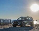 2023 BMW X7 xDrive 40i (Color: Sparkling Copper Grey; US-Spec) Front Three-Quarter Wallpapers 150x120