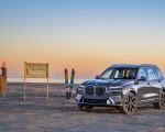 2023 BMW X7 xDrive 40i (Color: Sparkling Copper Grey; US-Spec) Front Three-Quarter Wallpapers 150x120