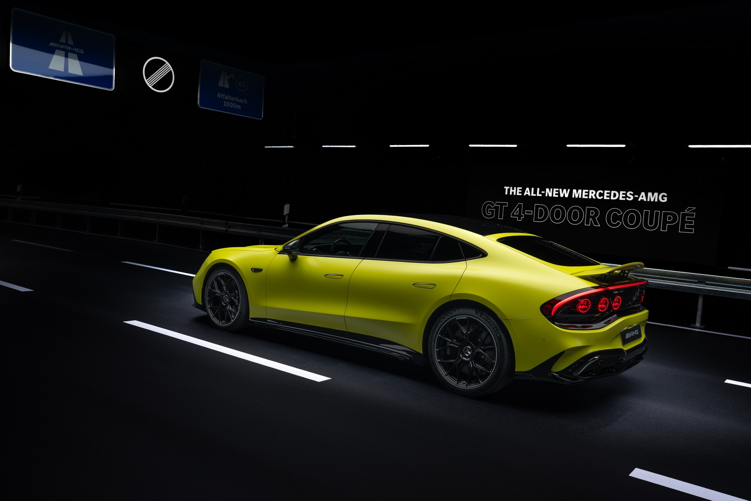 Download 2027 Mercedes-AMG GT 4-Door Coupe Rear Three-Quarter Wallpapers (9)