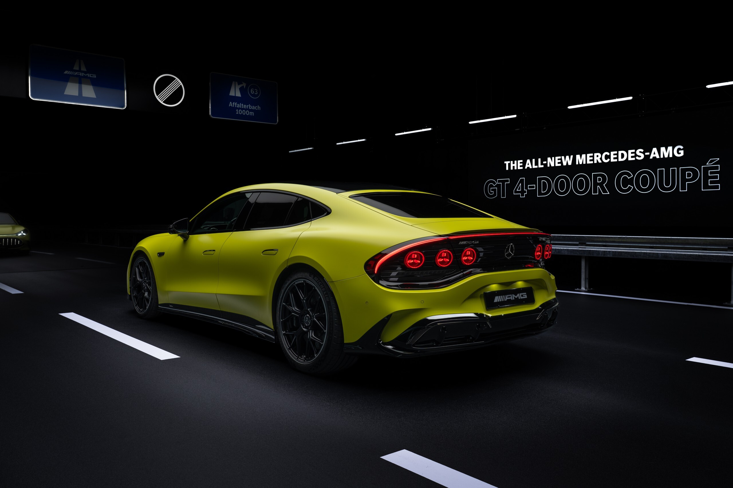 Download 2027 Mercedes-AMG GT 4-Door Coupe Rear Three-Quarter Wallpapers (13)